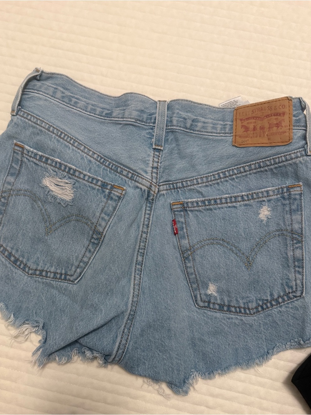 Levi's Light Wash High-Rise Distressed Denim Cutoff Shorts